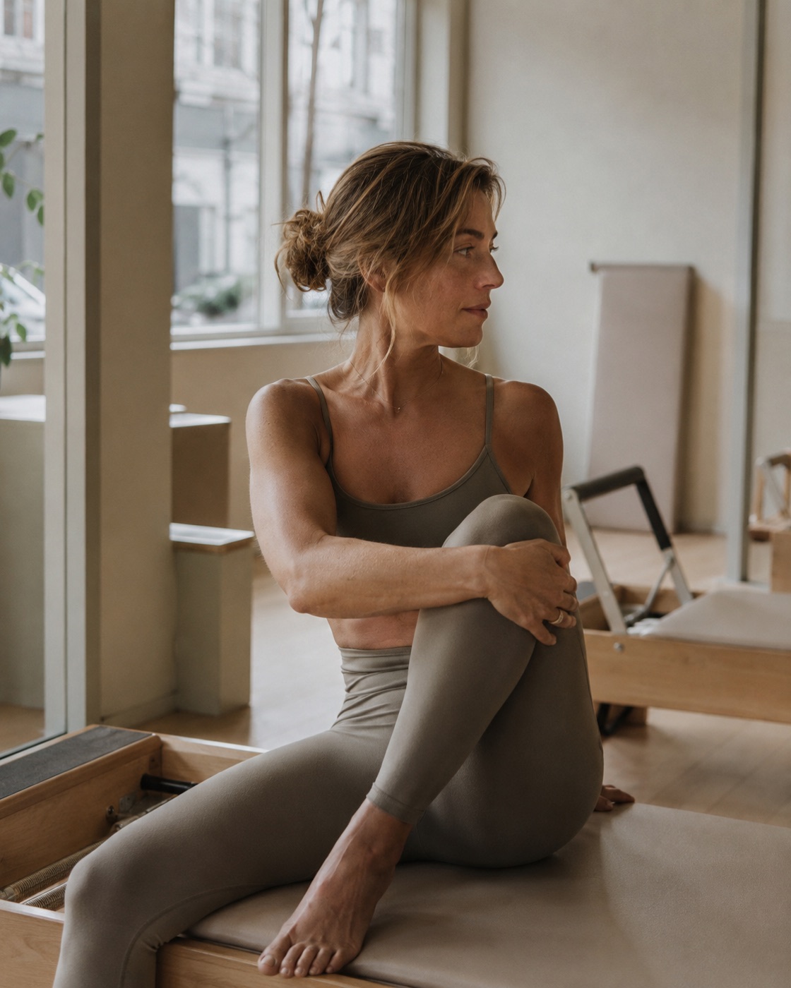 Woman in a calm pilates studio